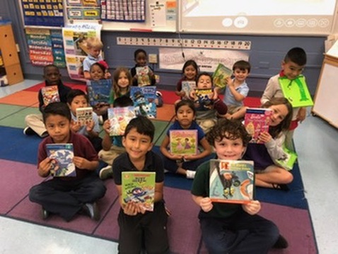 Class photo with their new books